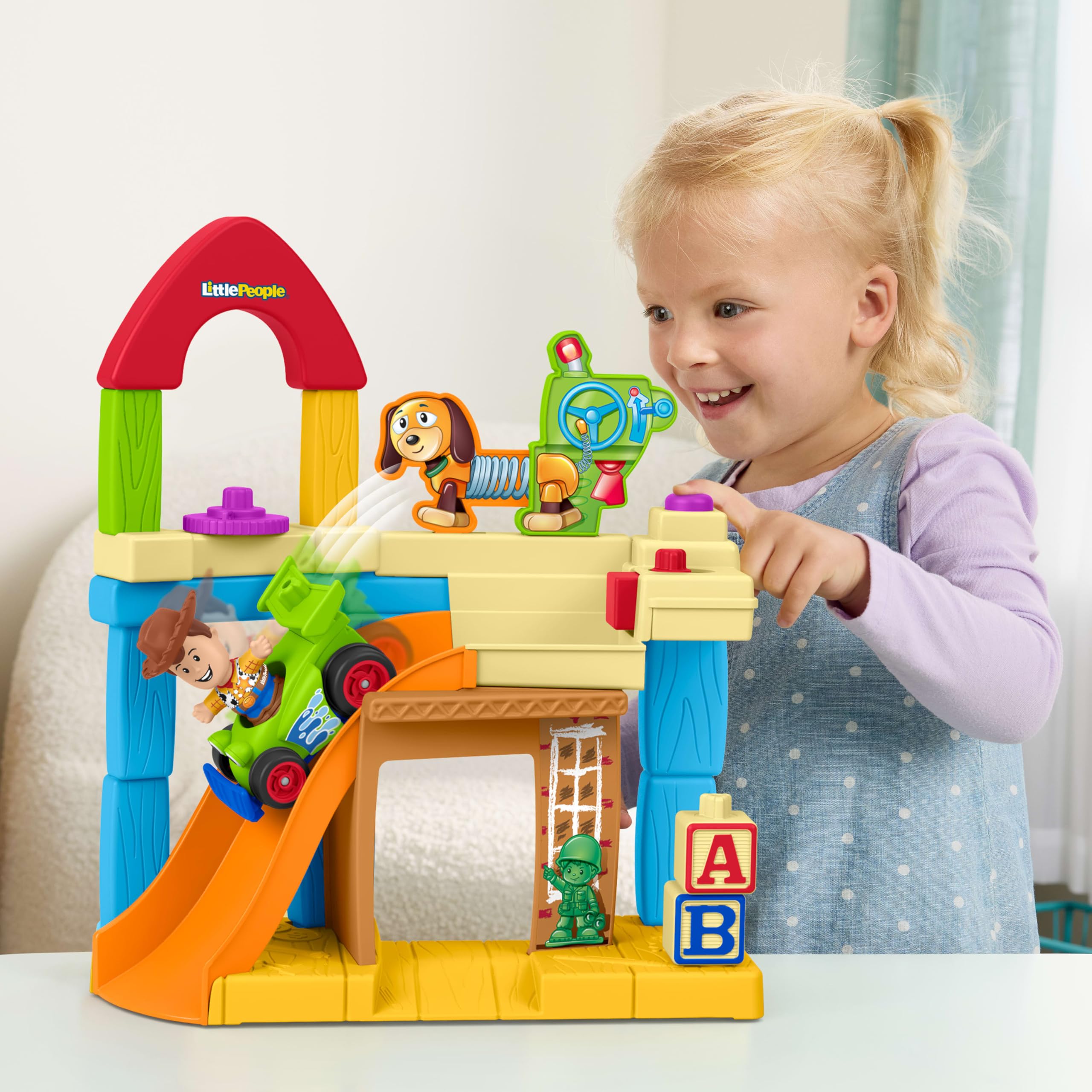 Fisher-Price Little People Toy Story Andy’s Room Playset with Woody Figure and RC Vehicle | Ages 18m+