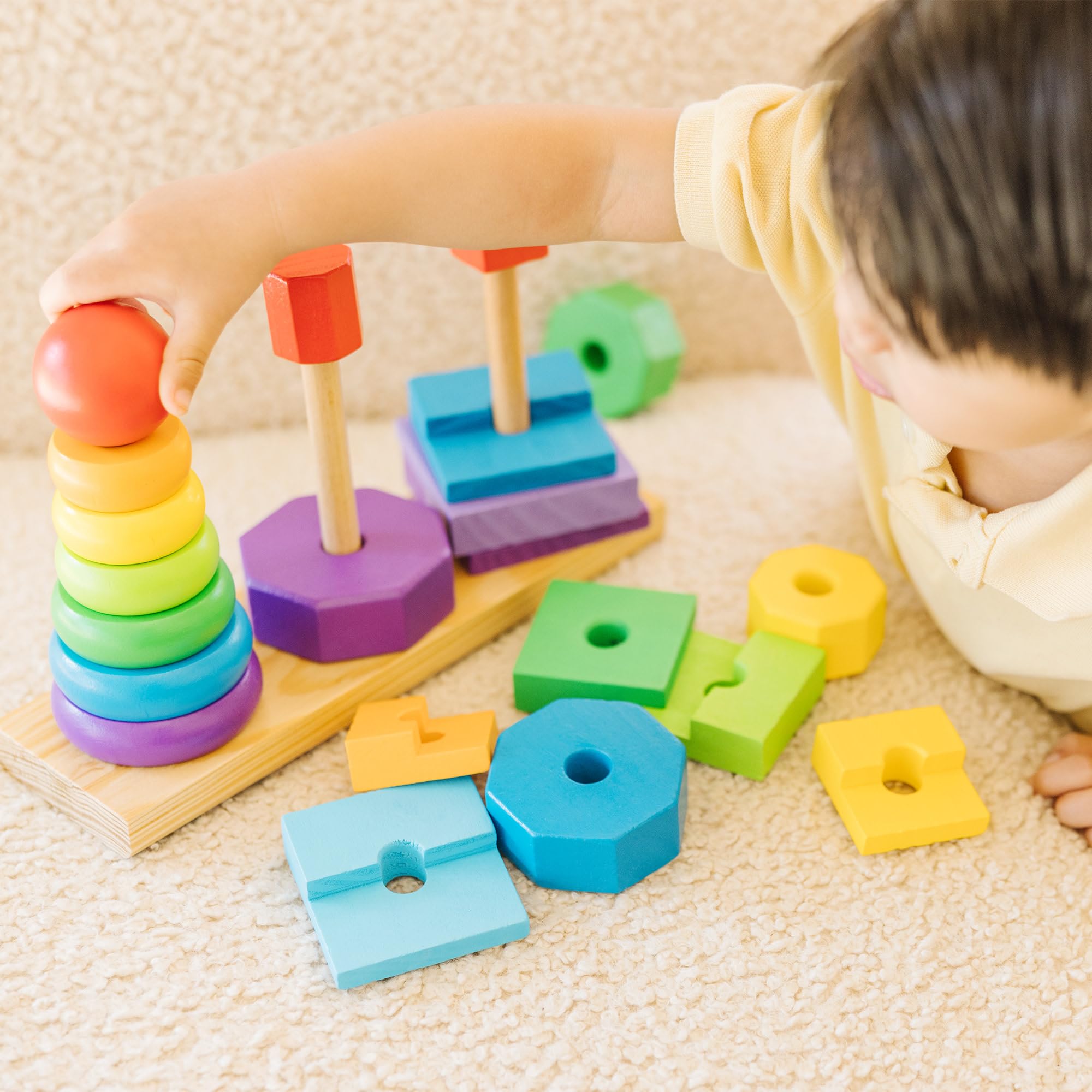 Melissa & Doug Geometric Stacker Wooden Development Toy | Ages 2-4 | Builds Motor Skills