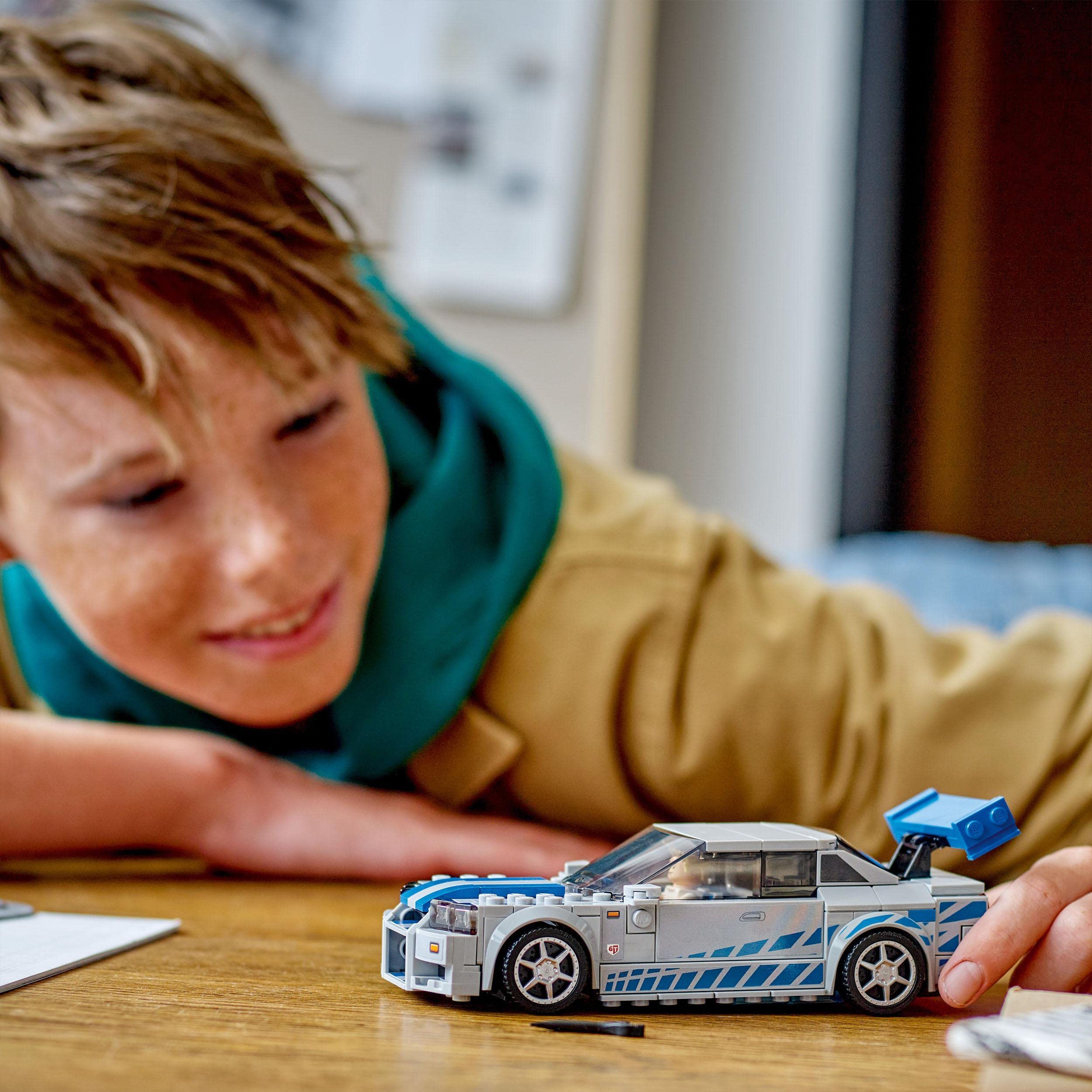 LEGO Speed Champions Nissan Skyline GT-R (R34) Race Car - 319-Piece Building Set for Ages 9+ 19